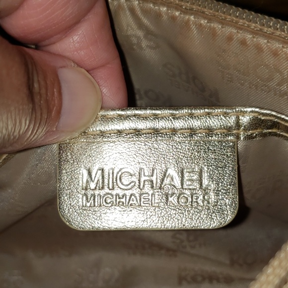 Michael Kors Metallic Logo Embossed Clutch Bag - Picture 8 of 8